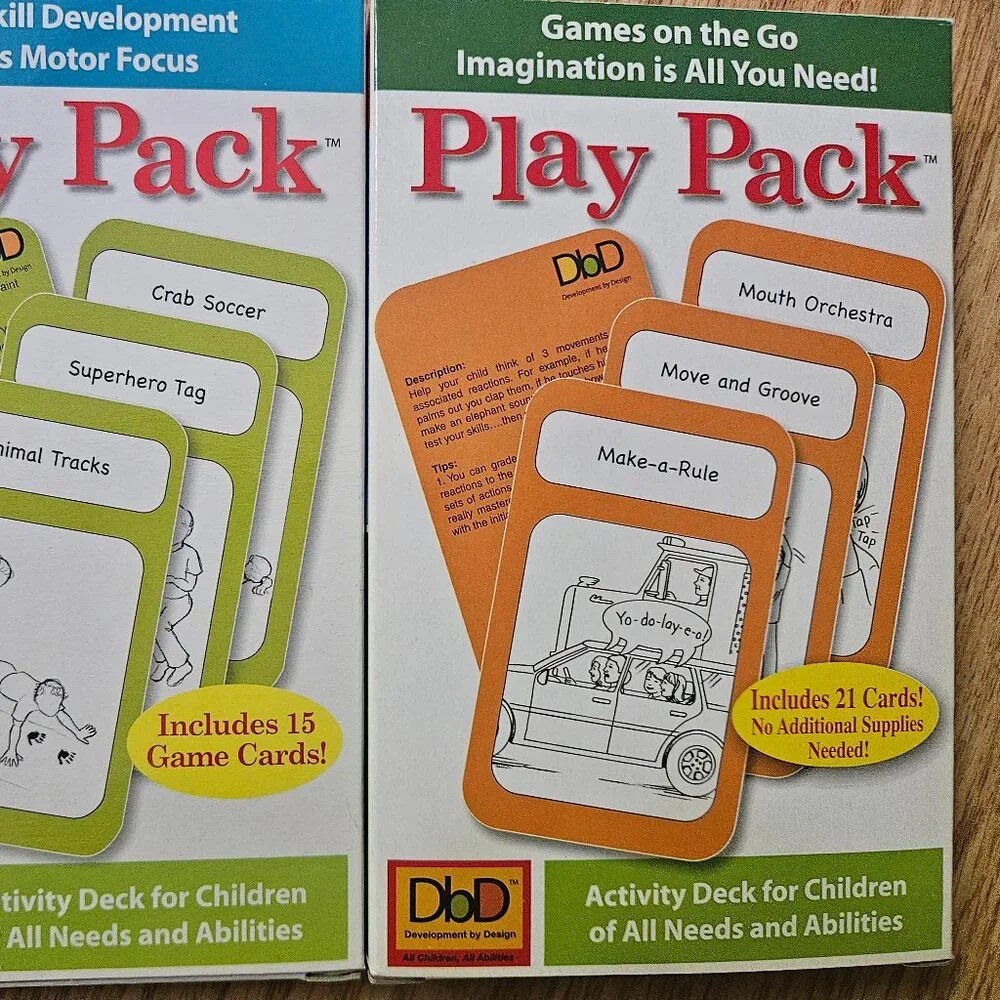 Kids Play Pack cards, Scrabble Slam, Guess Who game, crayons